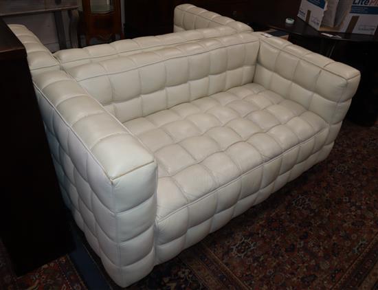 A pair of Josef Hoffmann Kubus ivory leather sofas W.150cm